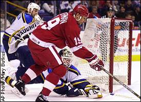 Roman Turek, Steve Yzerman